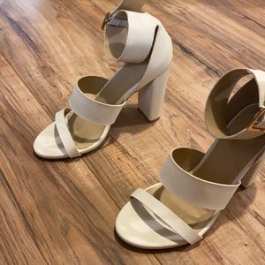Only worn once. White heels from Nana Macs.
